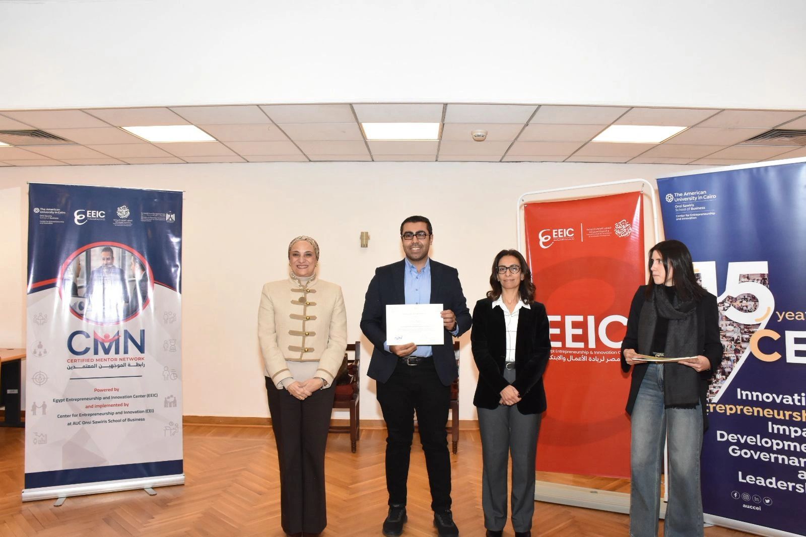 Aly Nafie receiving his Certified Mentor Network certification at AUC